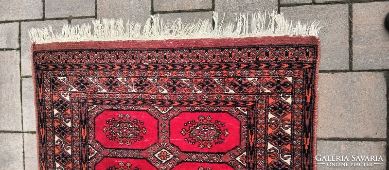 Hand-knotted Bokhara rug. Negotiable.