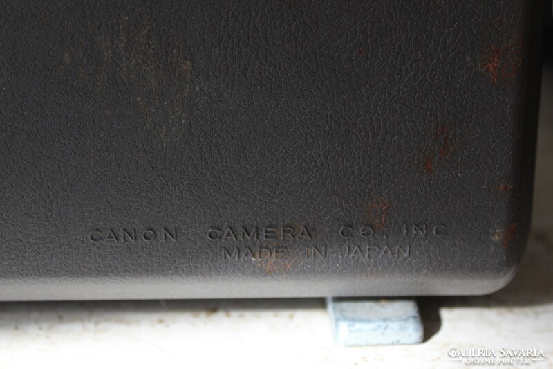 Canon s-2 cine projector in a portable box