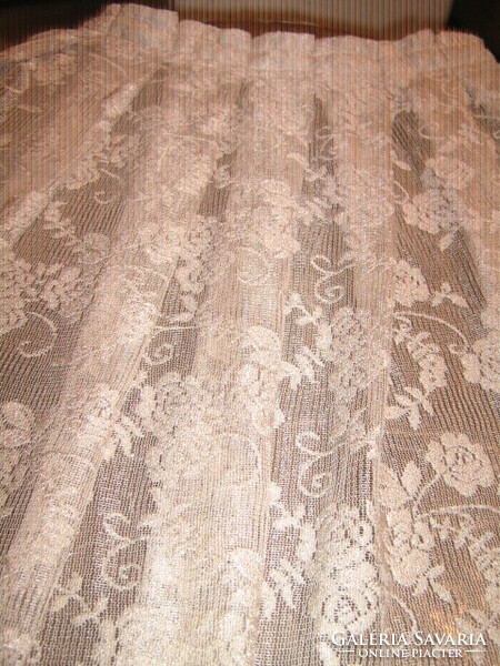 Beautiful antique gold colored floral curtain