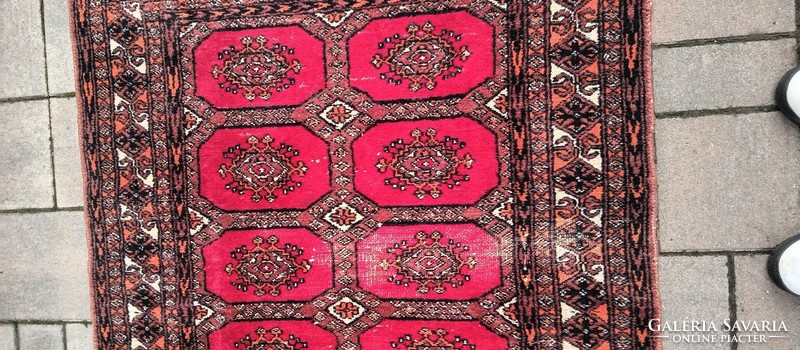 Hand-knotted Bokhara rug. Negotiable.