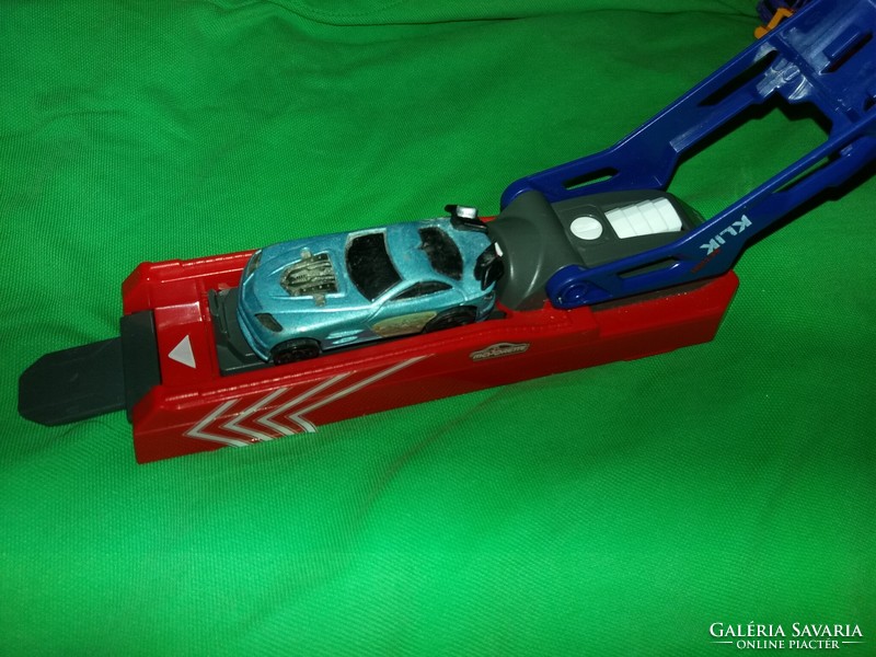 Retro majorette car launching catapult metal hot wheels together with small car, condition according to the pictures 2.