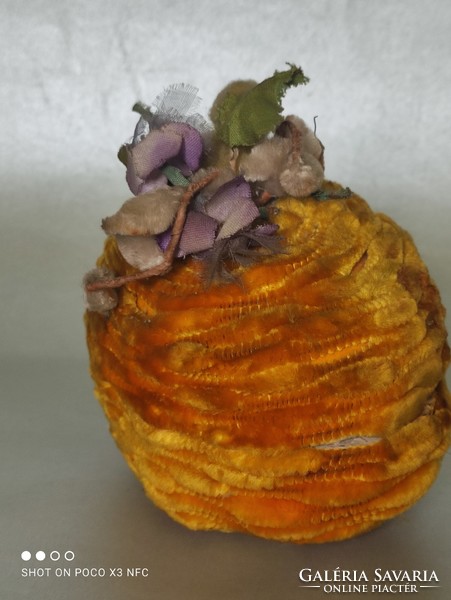Old paper egg candy holder covered with chenille