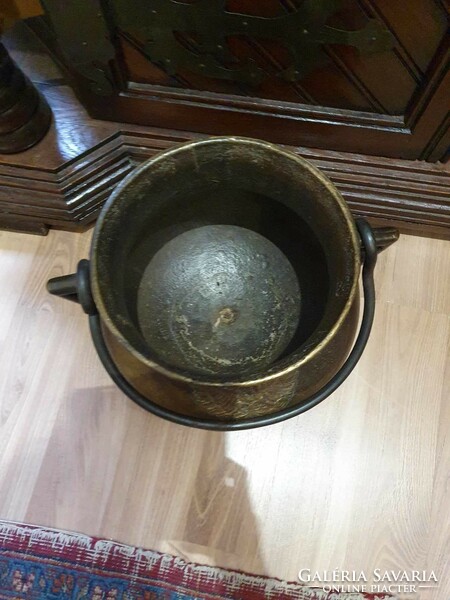 Bronze German three-legged cauldron, early-mid 17th century. It is in good condition for its age.