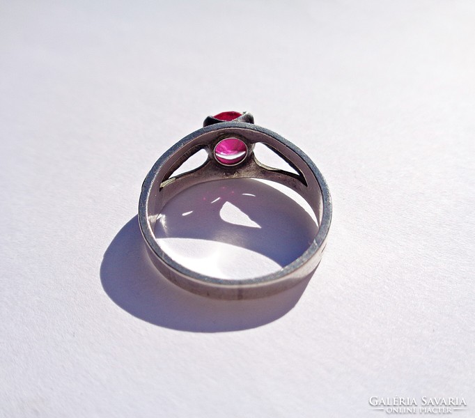 Silver ring with red stones