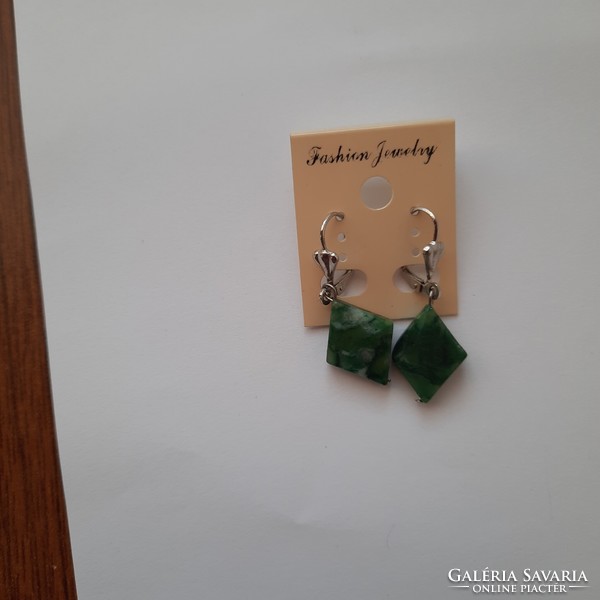 Earrings made of green mineral