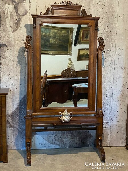 Refurbished neo-baroque standing mirror.