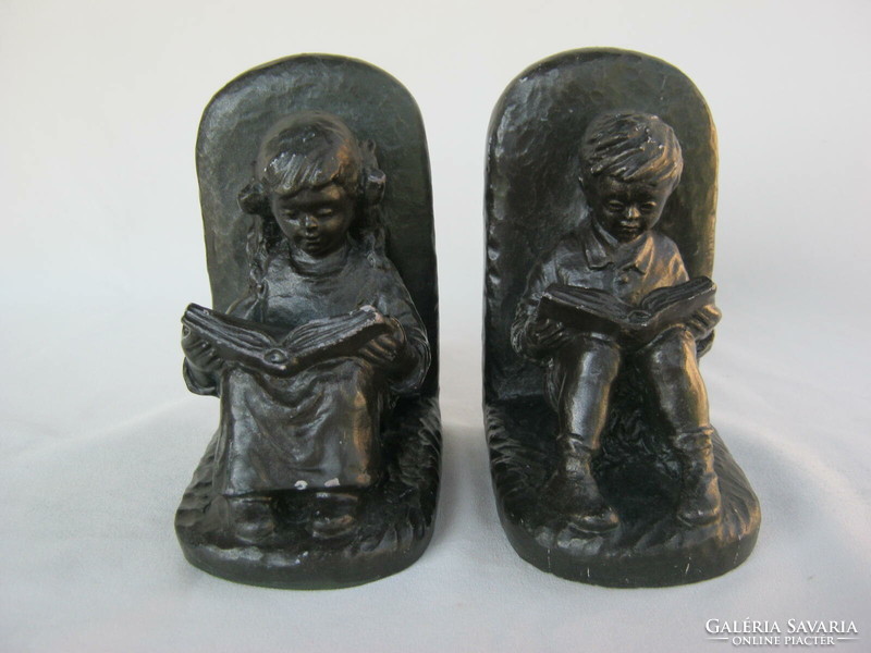 Bookend couple reading girl and boy