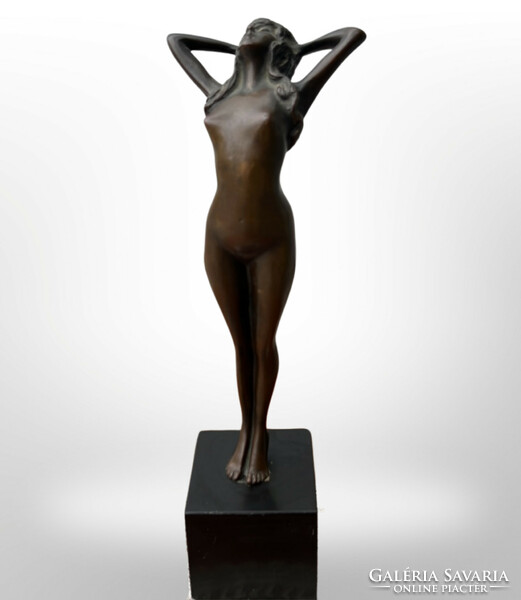 Female nude bronze statue on a granite plinth