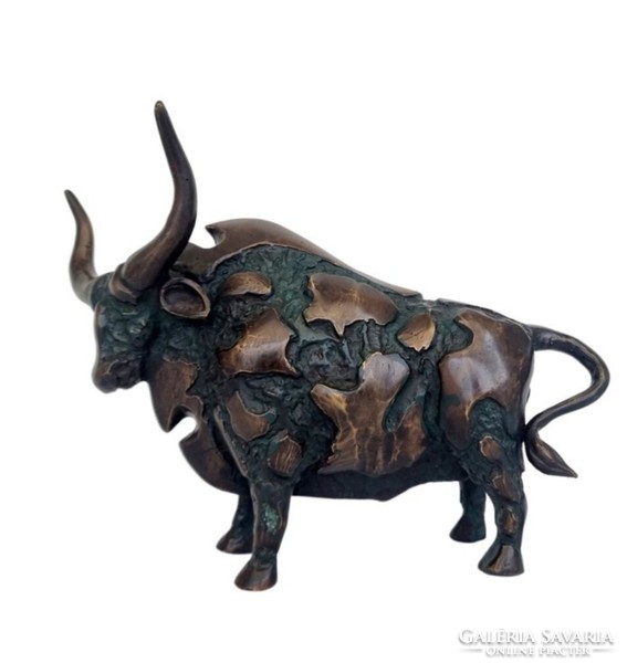 A beautiful, monumental bronze work of an elaborately beautiful bull