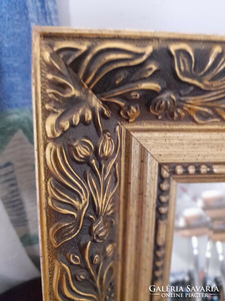 Mirror in a gilded wooden frame