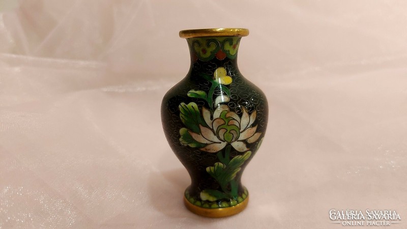 Copper enameled vase with flower decoration.