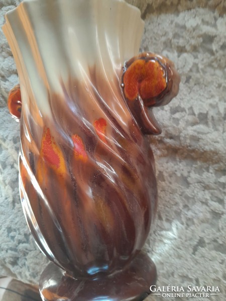 The ceramic vase is beautiful. 23 cm
