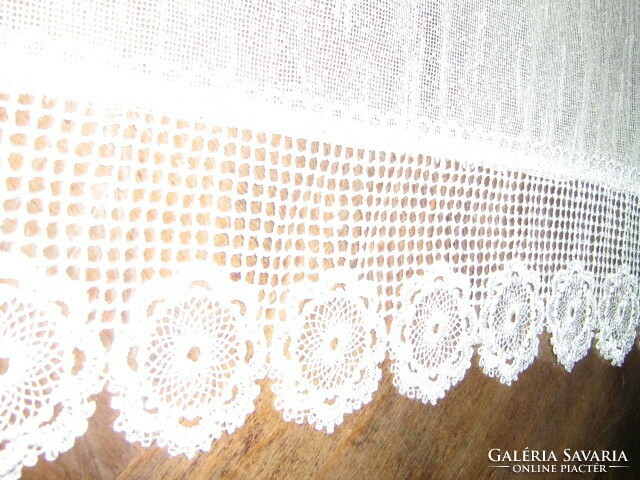 A pair of beautiful vintage-style stained glass curtains with a lace bottom