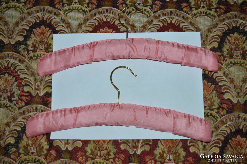 2 hangers covered with pink silk
