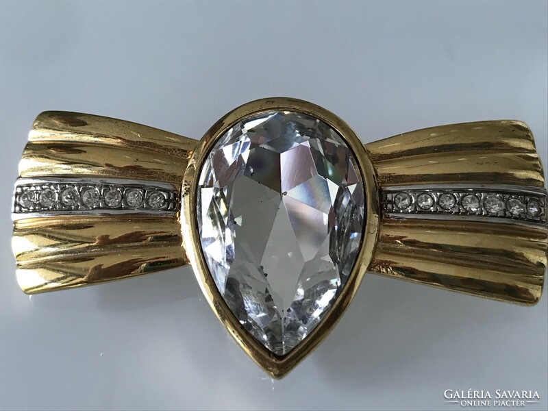 Bow-shaped brooch with huge polished crystal, 6.8 x 3.5 cm