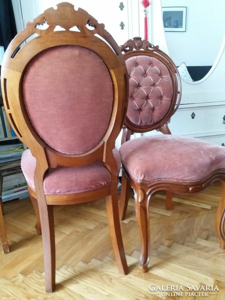 Pair of upholstered wooden chairs