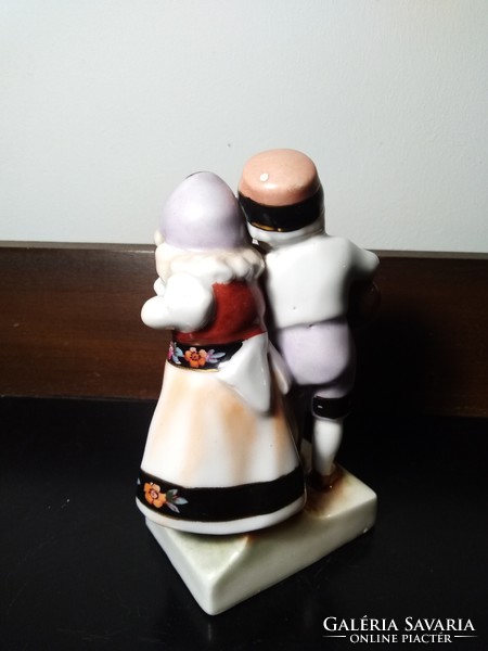 Pair of popular porcelain figurines