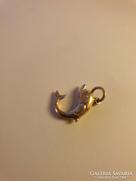 Dolphins gold pendant