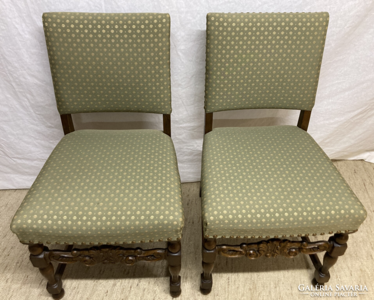 2 carved upholstered chairs