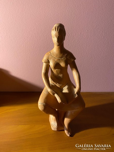 Sandor Mikus - terracotta statue of a seated woman with a book