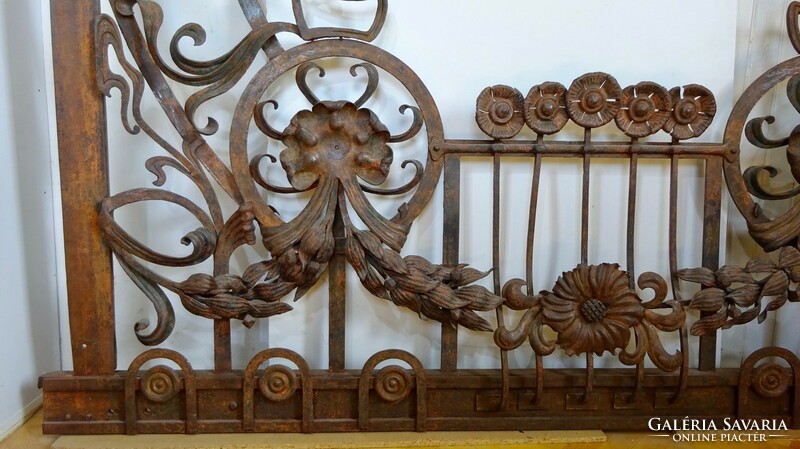 Antique wrought iron window frame frame grill from a French apartment house, with many plastic shapes + 1 railing