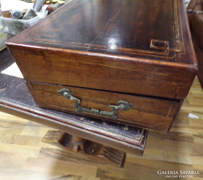 Pair of baroque French flintlock pistols, in box