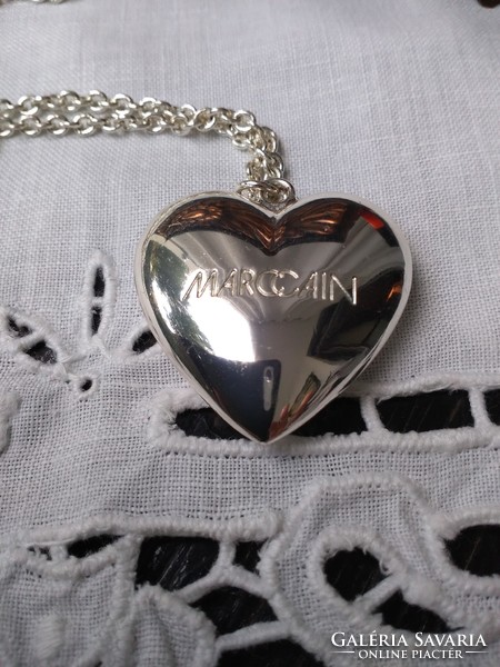 Silver colored marc cain marked pendant with chain