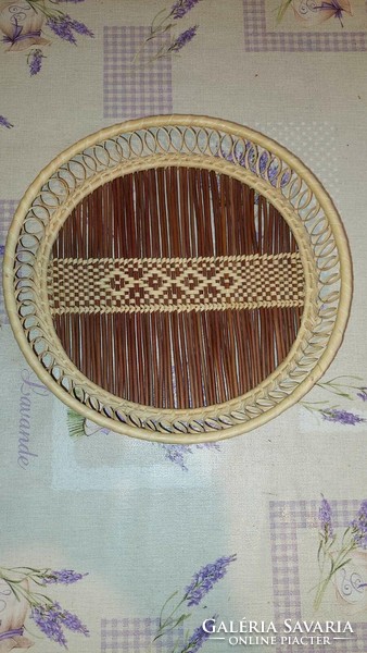 Wicker serving basket with a cross stitch pattern