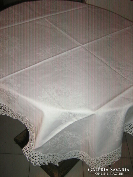 Beautiful vintage rosy silk tablecloth with lacy edges