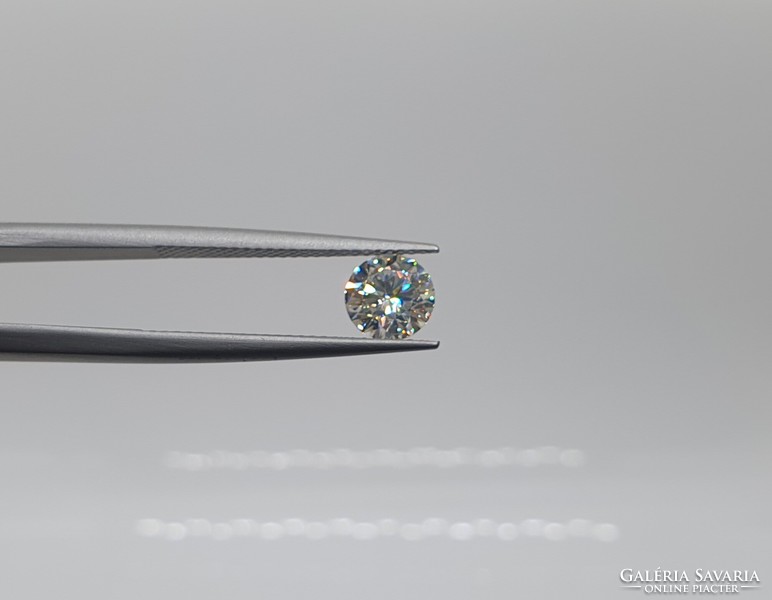 Extra 0.90 Carat brilliant cut moissanite. With certification.