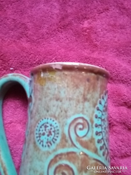 Hunter ceramic jug