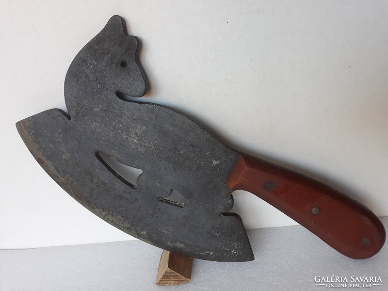 Old wrought iron fox-shaped sword