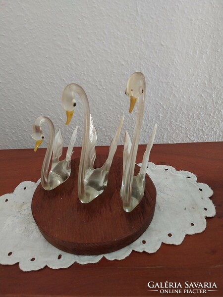 Swans from Murano on a wooden pedestal