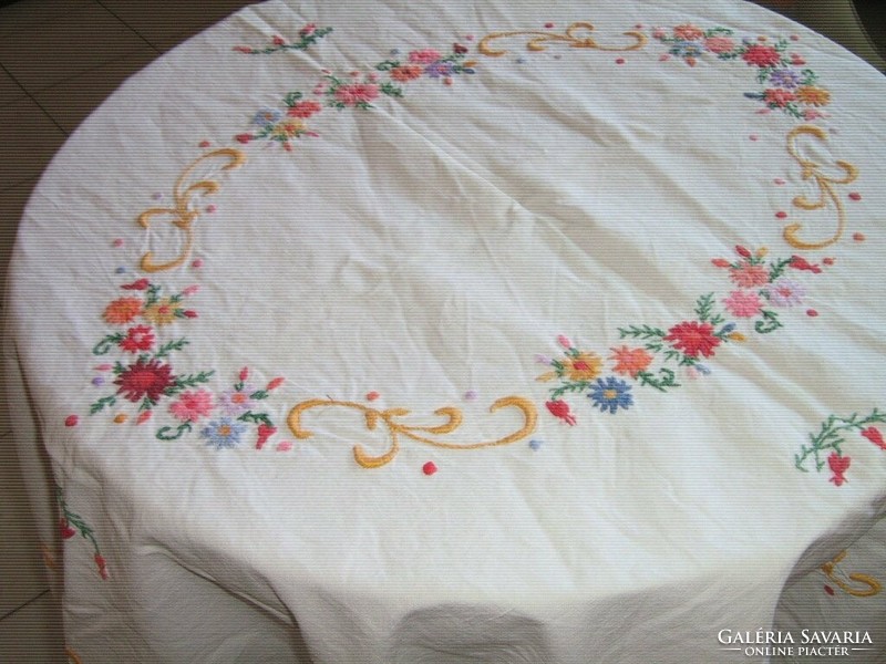 Beautiful tablecloth embroidered on antique vintage linen