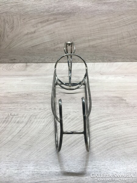 Old art deco sled-shaped glass holder