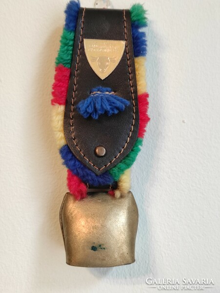 Brass cattle pigeon on a decorative leather strap
