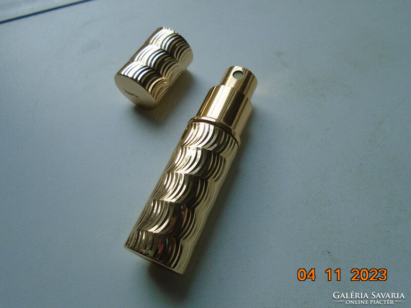 Art deco gilded metal housing with steam herb glass atomizer