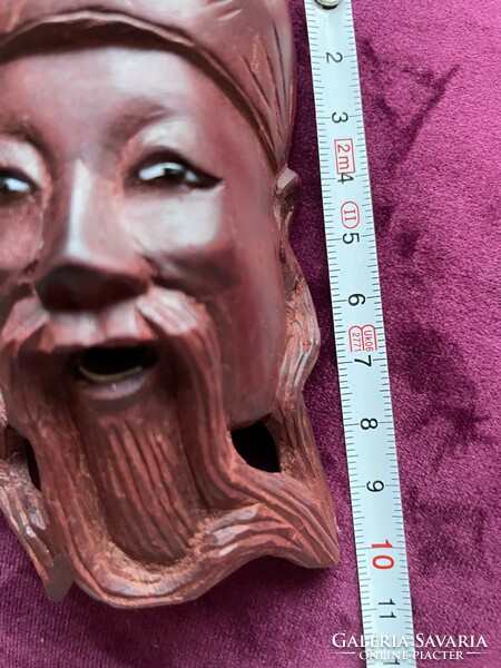 Carved wooden Chinese head, statue