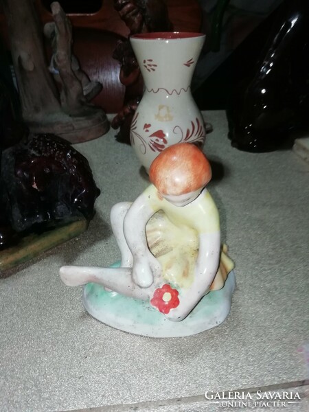 Ceramic girl in the condition shown in the pictures