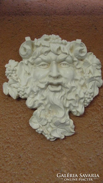 Huge bacchus head! To the wine bar, to the wine cellar