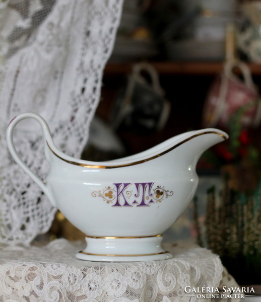Antique porcelain saucer with Kt monogram