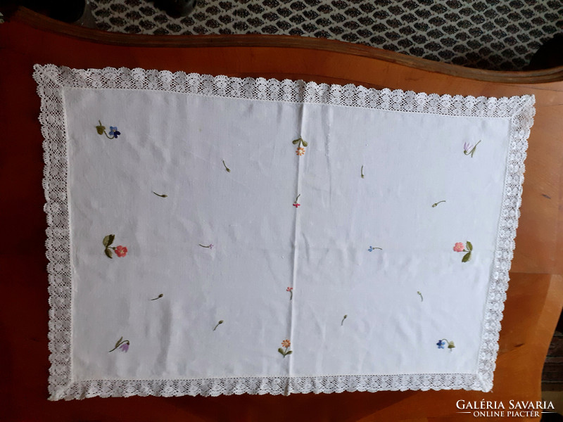 Old hand-embroidered tablecloth with a lace edge. 73X50 cm