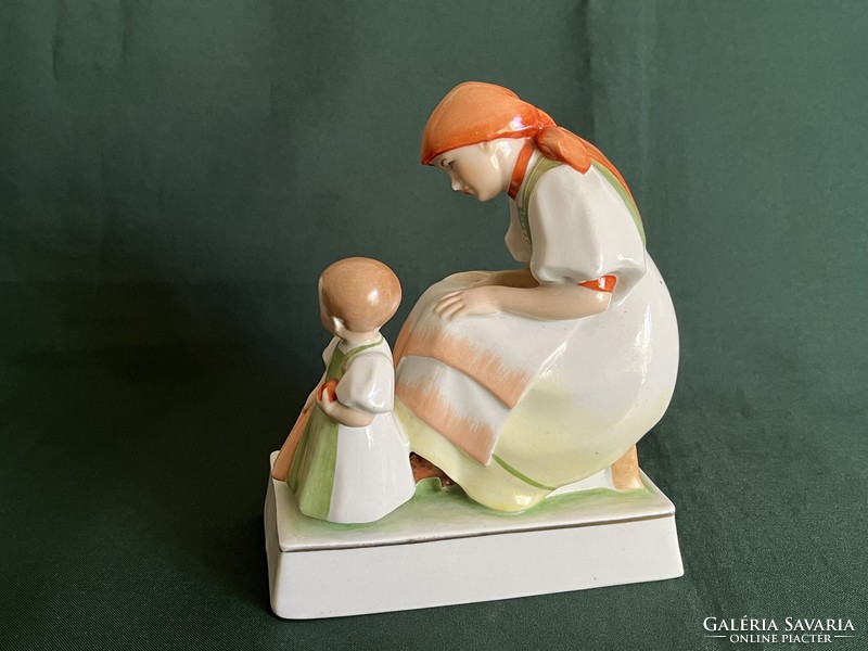 Porcelain figurine of Zsolnay Sinko mother with child with old shield seal (p0004)
