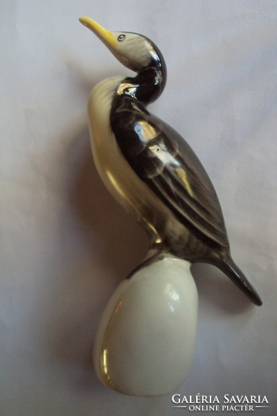 Hollóháza water bird, -/cormorant or cormorant/- hand-painted, porcelain sculpture, on a stable pedestal.