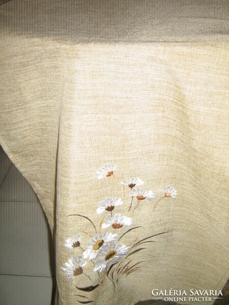 Wonderful machine embroidered runner on huge beige tablecloth