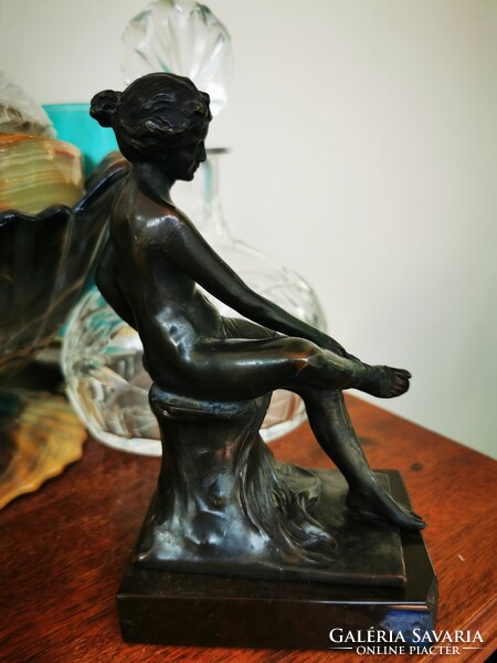 Antique bronze seated nude