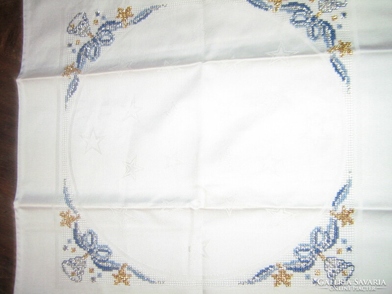 Beautiful hand-embroidered damask napkin with Christmas pattern