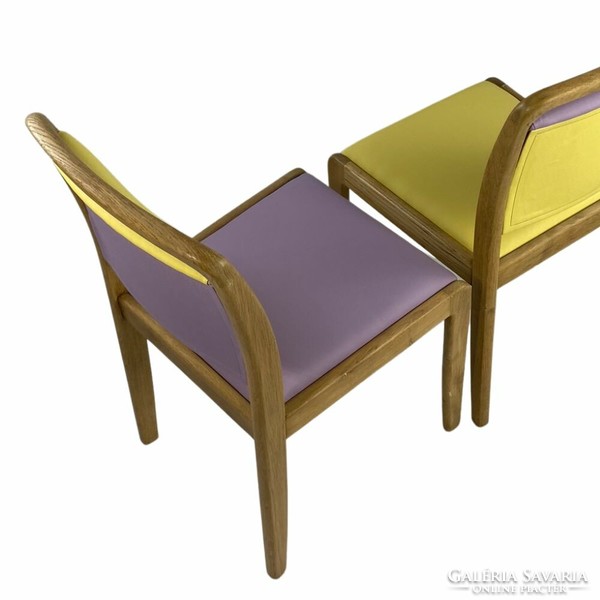 A pair of Scandinavian solid wood chairs urbanized. Pastel purple-yellow vegan leather