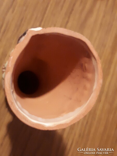 A slightly pink marked candle holder