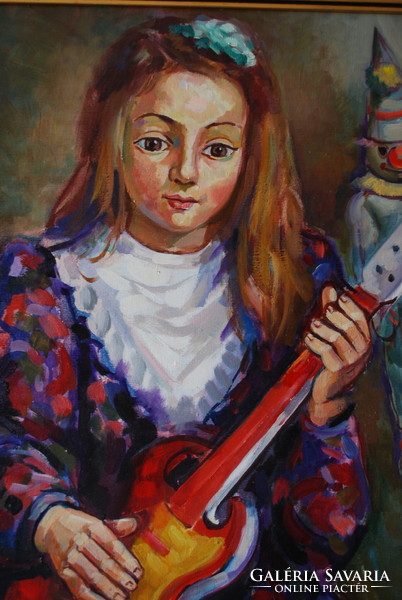 Little girl Józsa János with a guitar